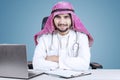 Handsome Arabic doctor smiling at camera Royalty Free Stock Photo