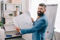 Handsome architect standing in modern office Royalty Free Stock Photo