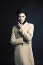 Handsome asian fashion looking man posing in studio on black background, lifestyle modern people concept close up Royalty Free Stock Photo