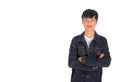 A handsome Asian man in black clothes stands arm crossing in Stu Royalty Free Stock Photo