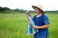 Handsome Asian man farmer is at paddy field