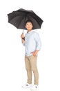 Handsome asian man standing under umbrella Royalty Free Stock Photo