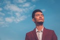 Handsome Asian model posing in the city streets Royalty Free Stock Photo