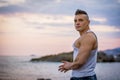 Handsome Athletic Man Looking Away Against Sky Royalty Free Stock Photo