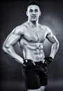 Handsome athletic man standing akimbo Royalty Free Stock Photo