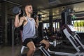 Handsome Athletic Men Exercising with dumbbells modern gym. Fitness men with naked torso doing workout