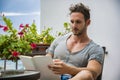 Handsome athletic young man reading book Royalty Free Stock Photo