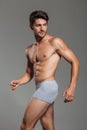 Handsome attractive man in underwear posing