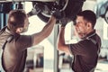 Handsome auto service workers Royalty Free Stock Photo