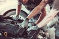 Handsome auto service workers Royalty Free Stock Photo