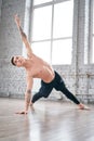 Handsome ballet dancer training in the gym