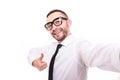 Handsome bearded young business man taking selfie with thumbs up isolated over white background Royalty Free Stock Photo