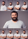 Handsome bearded, happy, smiling, excited, looking away, man with crossed hands in gray t-shirt looking at camera Royalty Free Stock Photo