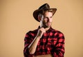 Handsome bearded macho. American cowboy. Beauty standard. Example of true masculinity. Cowboy wearing hat. Western life