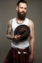 Handsome Bearded Man with Hat. tattoo Royalty Free Stock Photo