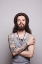 Handsome bearded man in hat.tattoo.hipster Royalty Free Stock Photo