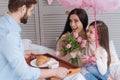 Handsome bearded man holding a tray with breakfast Royalty Free Stock Photo