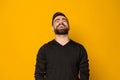 Handsome bearded man laughing isolated