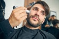 Portrait of kind male person being deep in thoughts Royalty Free Stock Photo