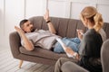 Handsome bearded man lying on the sofa Royalty Free Stock Photo