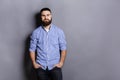 Handsome bearded man posing with hands in pocket Royalty Free Stock Photo