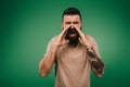 Handsome bearded man screaming isolated Royalty Free Stock Photo