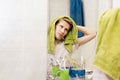 Handsome bearded man with towel, drying hair in a bathroom near mirror Royalty Free Stock Photo