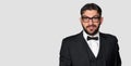 Handsome bearded man in tuxedo and glasses Royalty Free Stock Photo