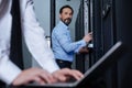 Handsome bearded man working with his colleague Royalty Free Stock Photo