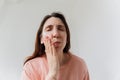 Handsome bearded woman suffering from toothache, closeup,