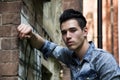 Handsome black haired young man in denim shirt Royalty Free Stock Photo