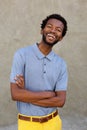 Handsome black man smiling with arms crossed Royalty Free Stock Photo