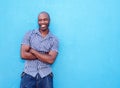 Handsome black man smiling with arms crossed Royalty Free Stock Photo