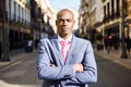 Handsome black man wearing suit in urban background Royalty Free Stock Photo