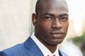 Handsome black man wearing suit in urban background Royalty Free Stock Photo