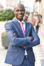 Handsome black man wearing suit in urban background Royalty Free Stock Photo