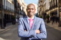 Handsome black man wearing suit in urban background Royalty Free Stock Photo