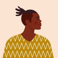 Handsome black man. Young african american. Portrait of young guy with hair. Side view. Isolated on a beige background. Royalty Free Stock Photo