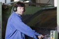 Handsome blue collar worker in factory Royalty Free Stock Photo