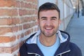 Handsome blue eyed man smiling outdoors