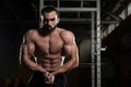 Handsome Body Builder Making Most Muscular Pose Royalty Free Stock Photo