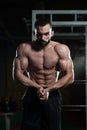 Handsome Body Builder Making Most Muscular Pose Royalty Free Stock Photo