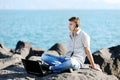 Handsome boy listening to music from his laptop Royalty Free Stock Photo