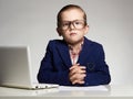 Handsome boy in office.business child Royalty Free Stock Photo