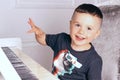 Boy playing the piano Royalty Free Stock Photo