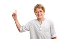 Handsome Boy pointing at copy space. Royalty Free Stock Photo