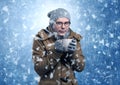 Handsome boy shivering at snowstorm concept Royalty Free Stock Photo