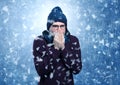 Handsome boy shivering at snowstorm concept Royalty Free Stock Photo