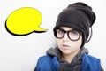 Handsome boy is wearing black cap and eyeglasses with an empty thought bubble. Royalty Free Stock Photo