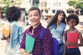 Handsome brazilian male student with group of students